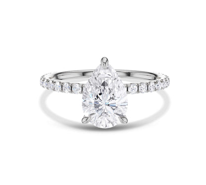 White gold pavé diamond engagement ring with pear shape