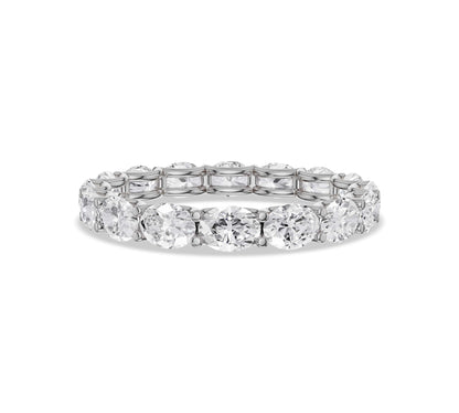 White gold eternity band with oval moissanites