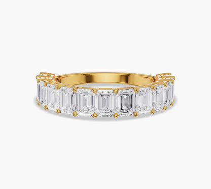 Half eternity band with emerald cut diamonds