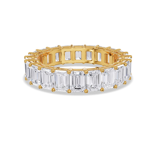 Wide band with emerald cut diamonds
