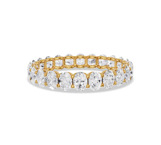Oval cut diamond eternity ring in yellow gold