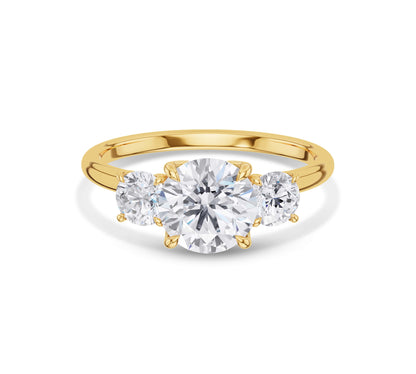 Classic three stone diamond ring gold