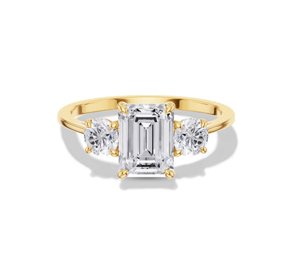 emerald diamond three stone enagement ring