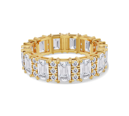 uxurious 18K yellow gold eternity band with emerald-cut and round diamonds