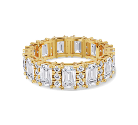 uxurious 18K yellow gold eternity band with emerald-cut and round diamonds