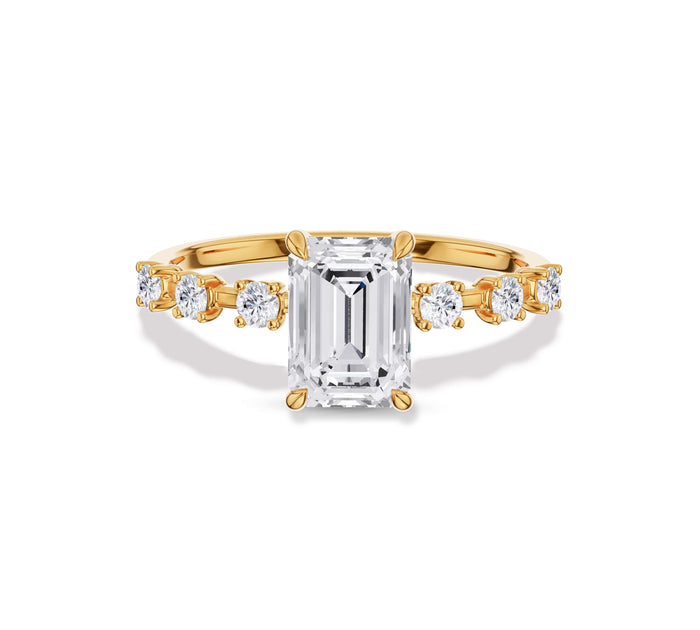 Emerald Diamond Engagement Ring with Side Stone