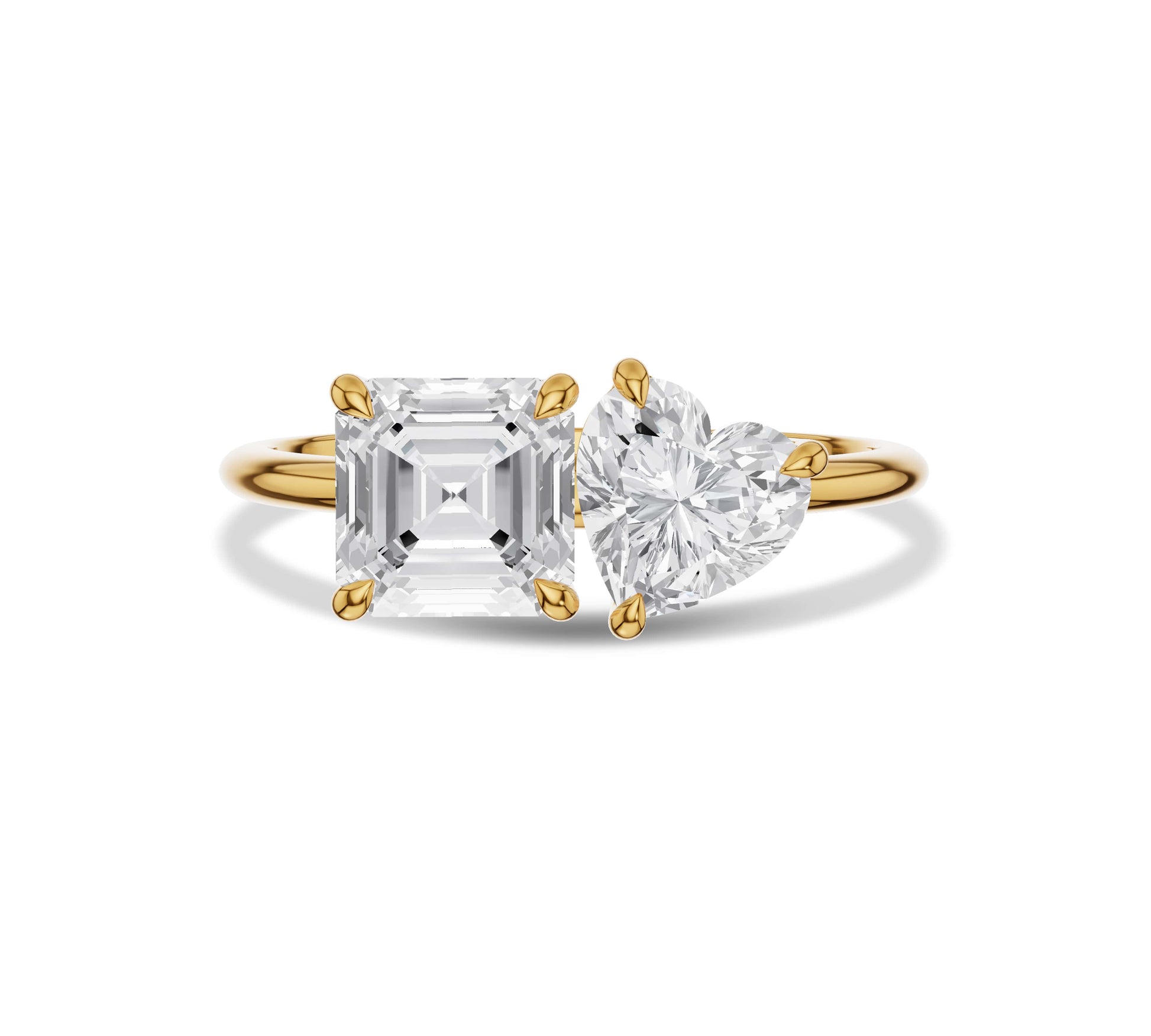 Yellow gold Toi et Moi ring with asscher and heart shaped diamonds
