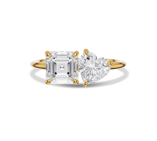 Yellow gold Toi et Moi ring with asscher and heart shaped diamonds