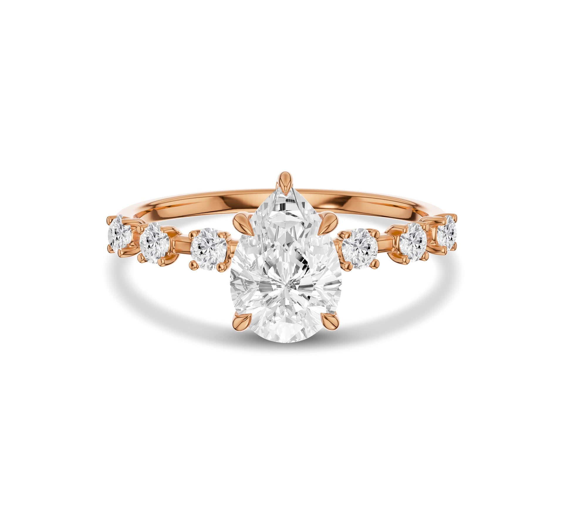 Rose gold pear shape engagement ring with side diamonds