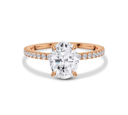Side-view of modern floating diamond ring in gold