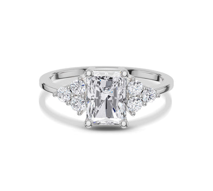 White gold radiant cut ring with diamond clusters