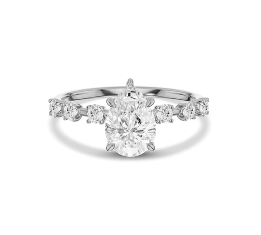 Pear cut diamond engagement ring in white gold