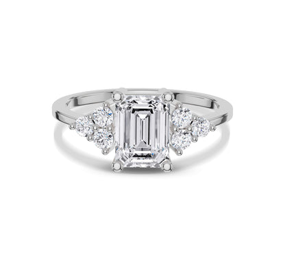 Engagement ring with organic emerald setting