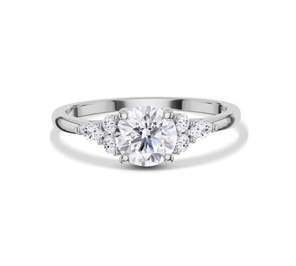 Round cut solitaire with delicate petal-style diamond accents