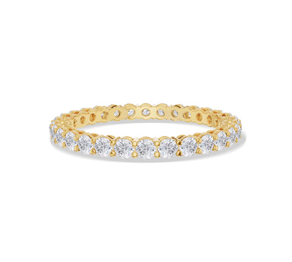 Round-cut diamond eternity ring in yellow gold