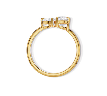 Modern engagement ring with pear shaped lab diamonds in yellow gold