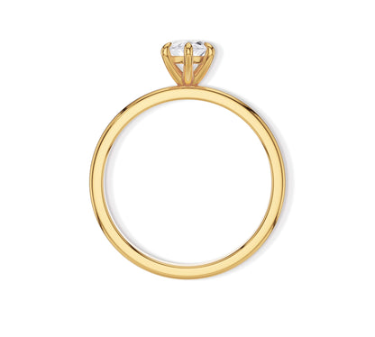 Side profile of marquise diamond engagement ring on finger