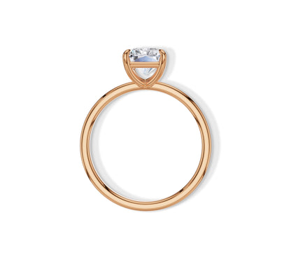 Four-prong radiant solitaire ring in 14k yellow gold