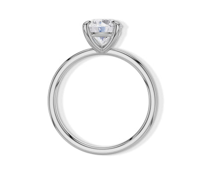 Simple and iconic round cut diamond ring.