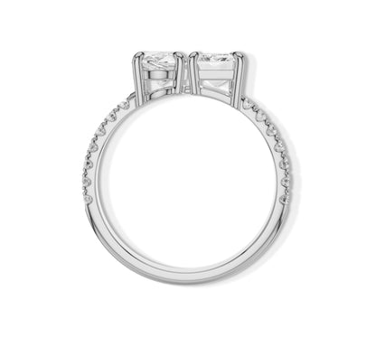 Elegant white gold band with oval and emerald cut stones