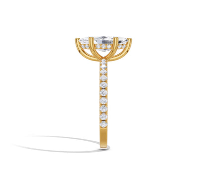 marquise cut engagement ring in yellow gold halo design