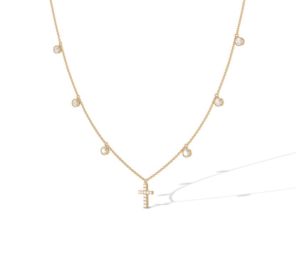 Yellow gold fine chain necklace with single cross and diamonds