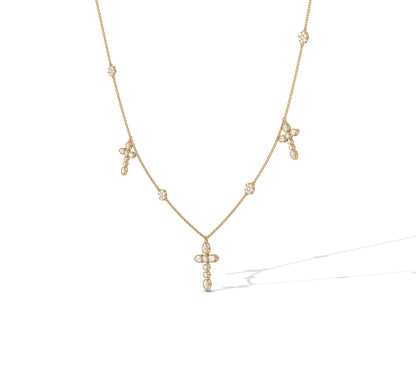 Dainty yellow gold necklace with diamond floral charm drops