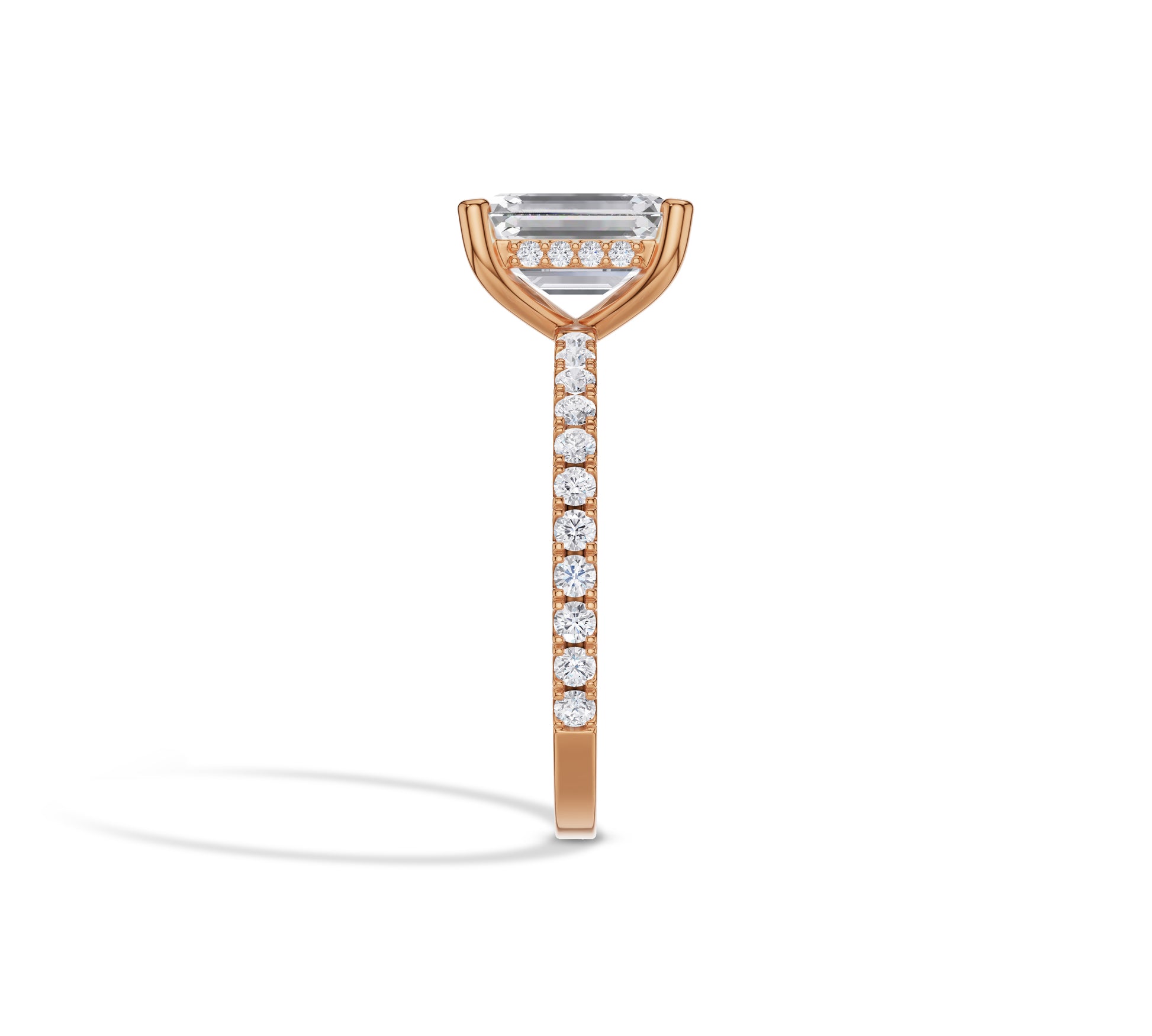 Elegant emerald solitaire in rose gold band