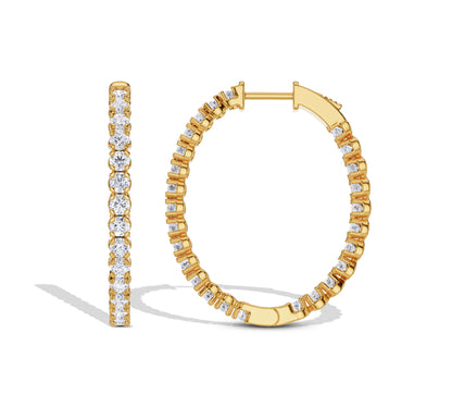 Yellow gold hoop earrings with diamonds