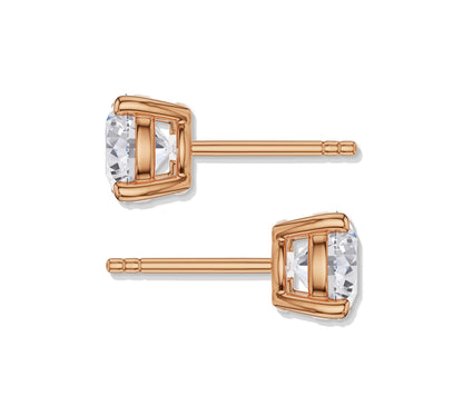 Soft hue round diamond studs