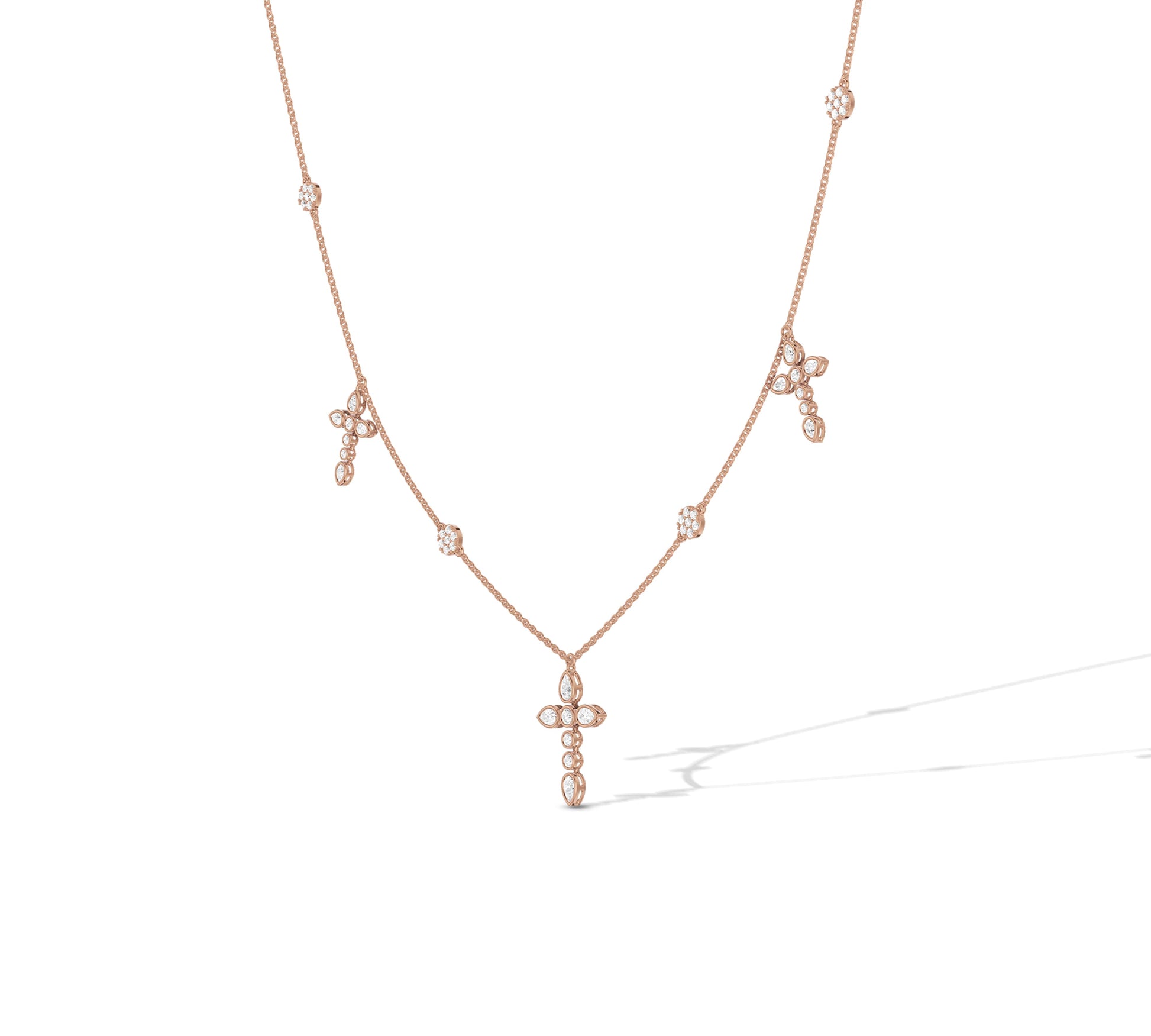 Feminine rose gold cross necklace with floral sparkle