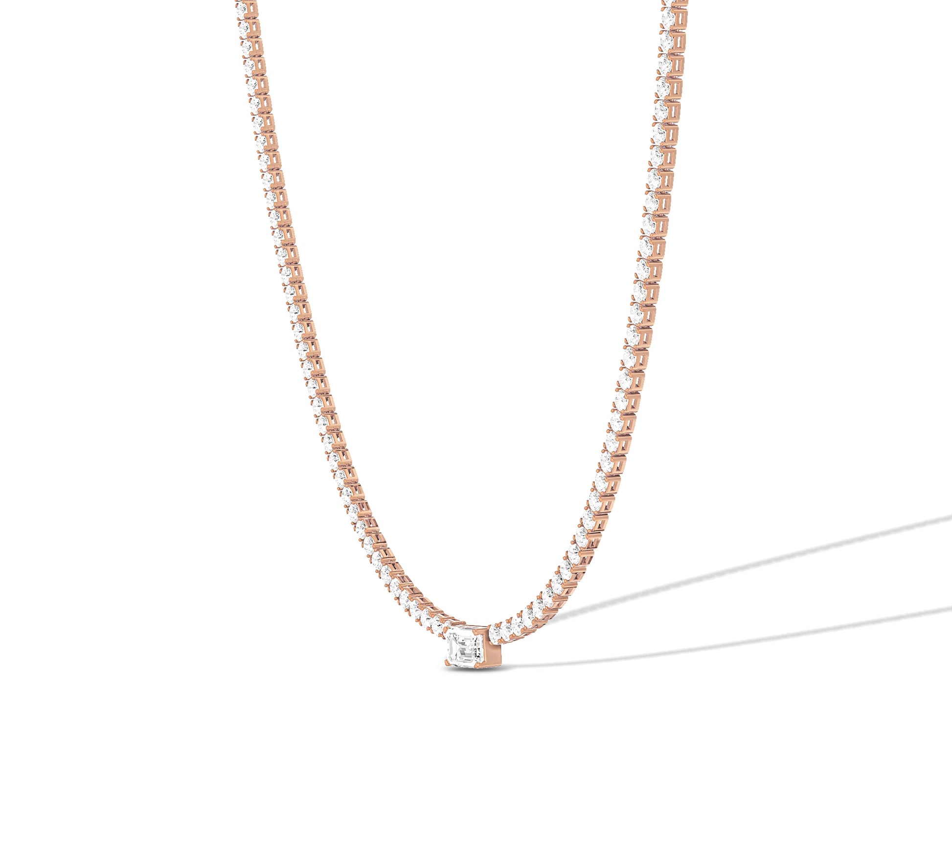 Elegant gold tennis necklace with emerald cut