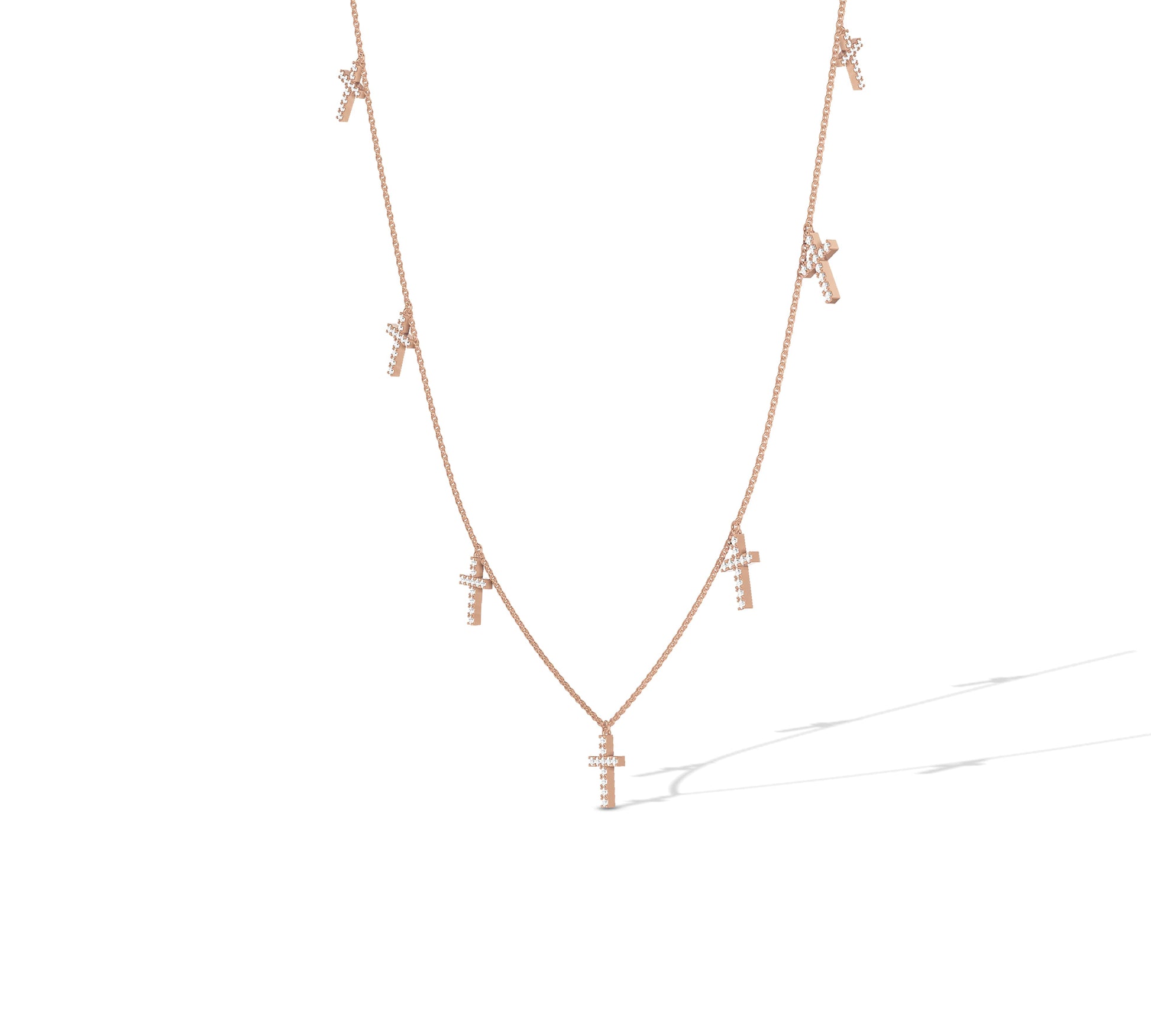 Stylish 14K rose gold multi-cross drop necklace