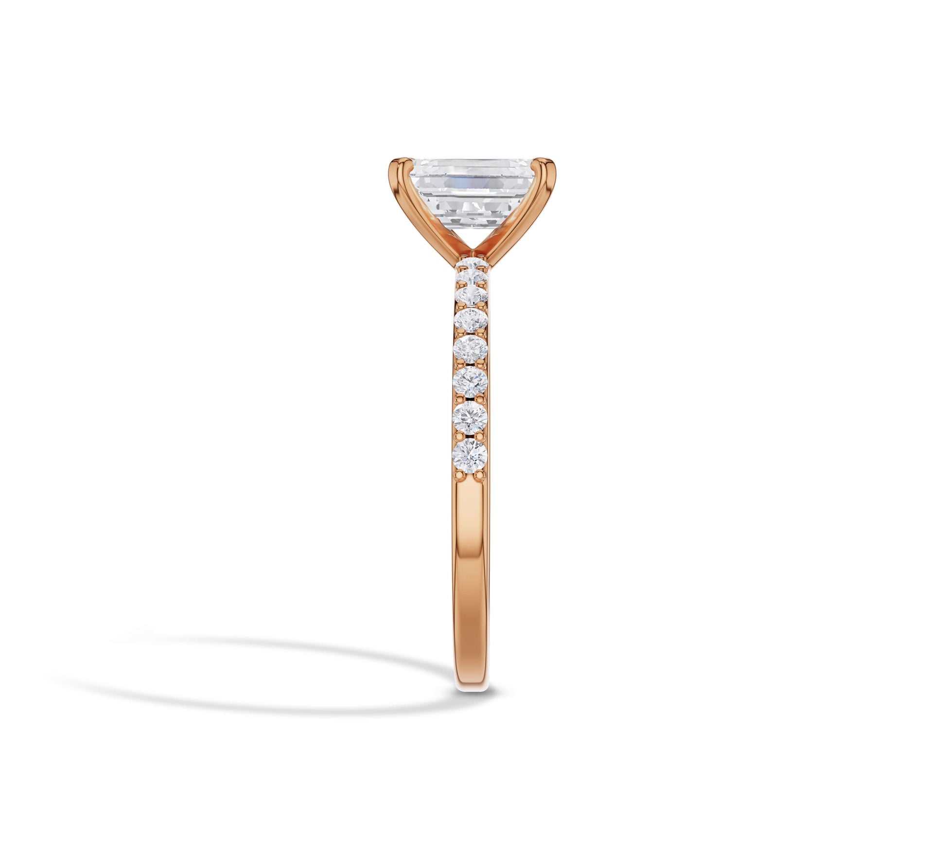 rose gold emerald & diamond engagement rings