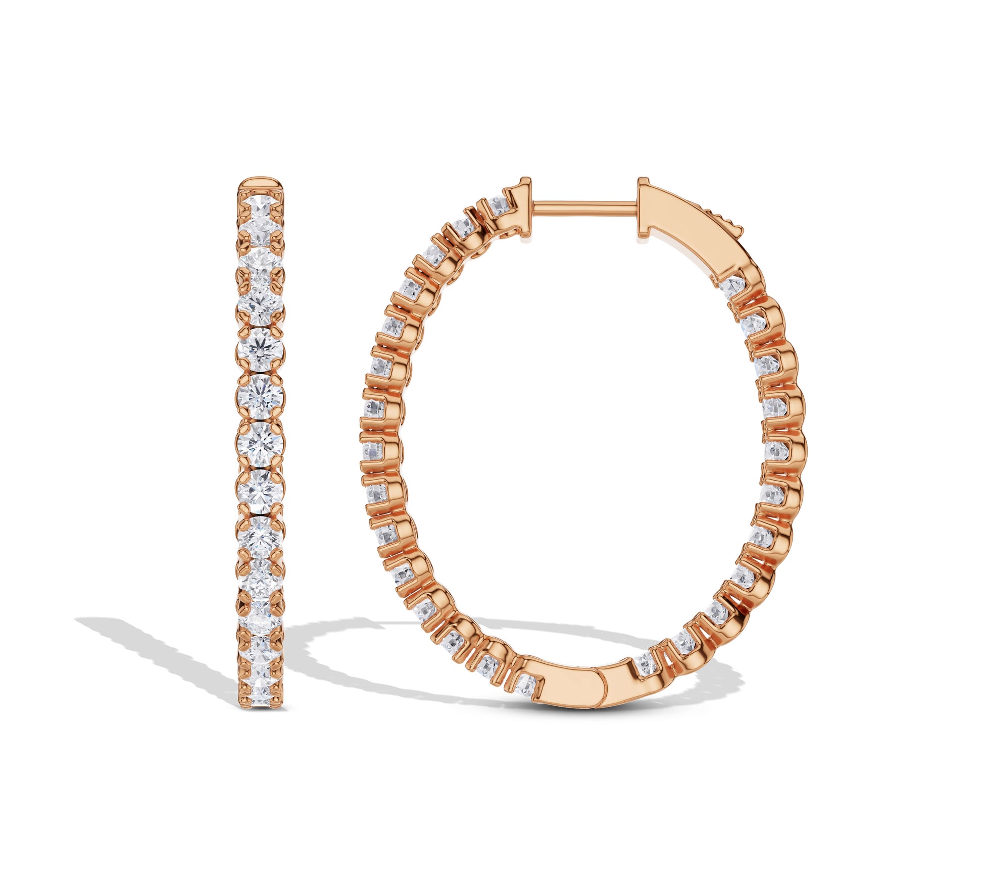 Gold hoop earrings with prong-set diamonds