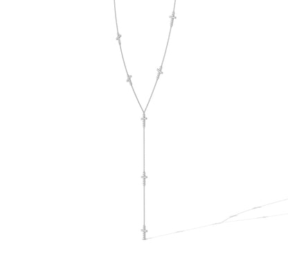 Luxe gold Y-necklace with dangling diamond crosses