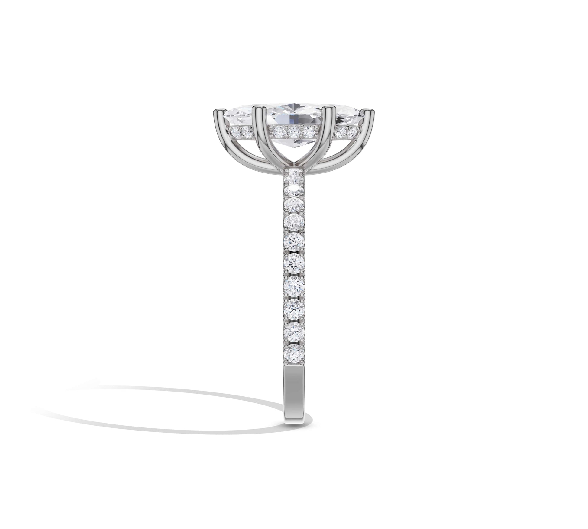Modern white gold marquise solitaire with halo sparkle