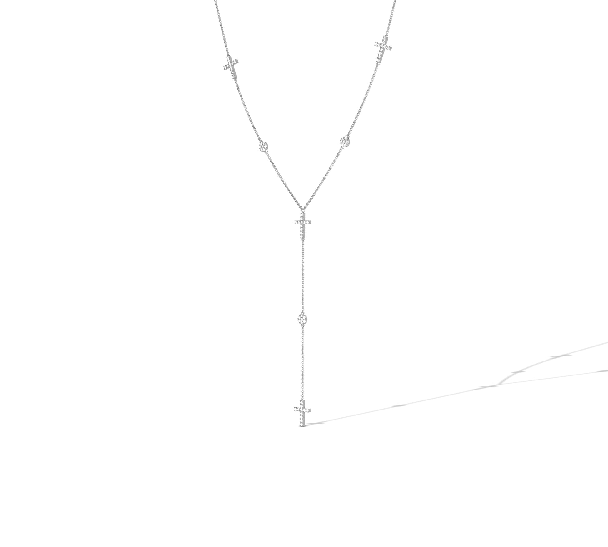 Elegant white gold lariat with cross and diamond details