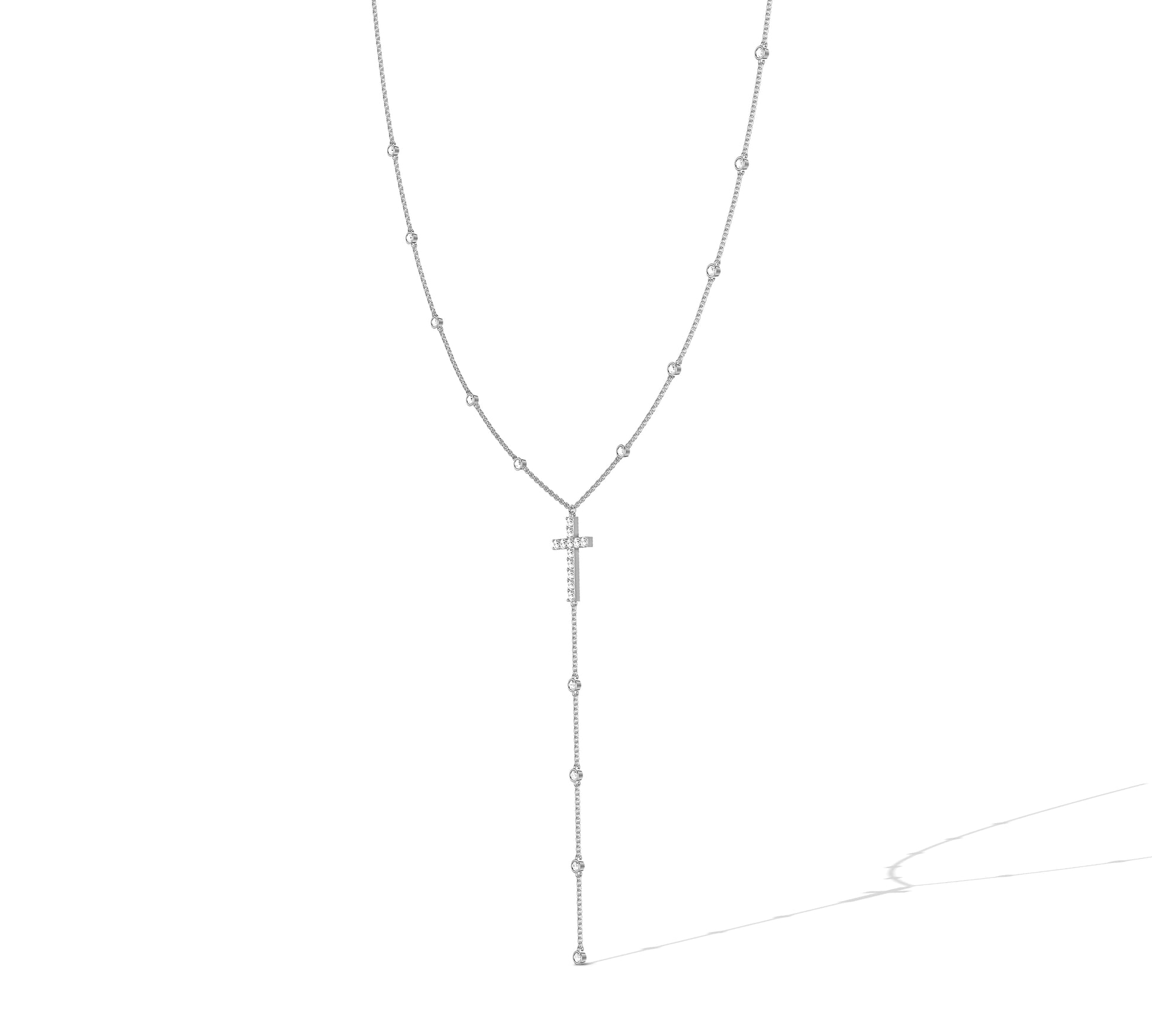 Fine gold chain with cross and round diamond accents