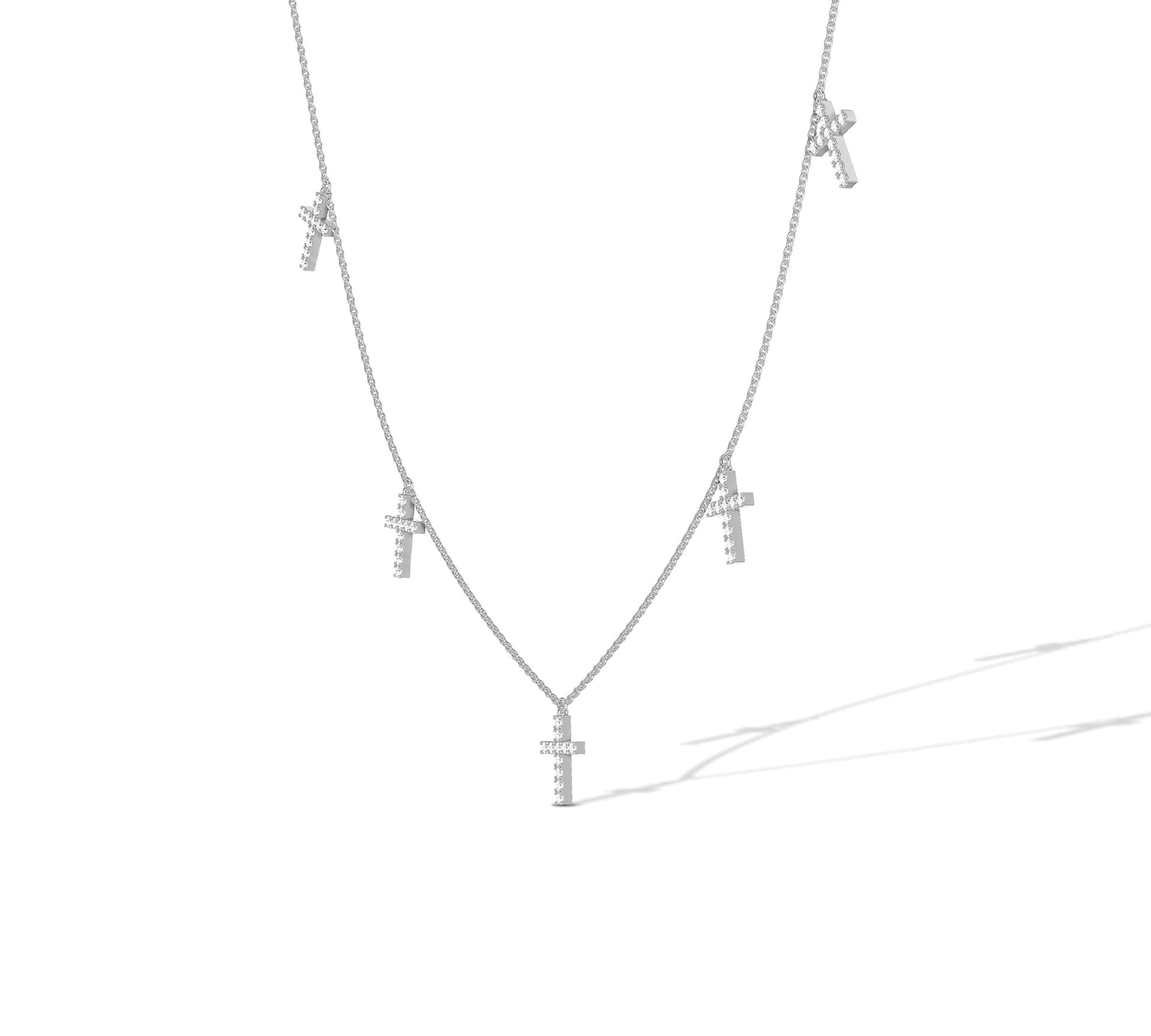White gold necklace with scattered cross motifs