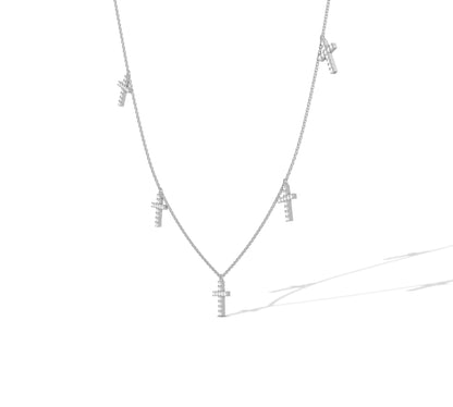 White gold necklace with scattered cross motifs