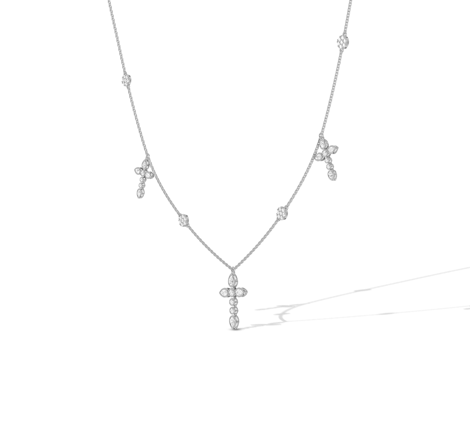 Elegant white gold necklace with pear and round cluster cross