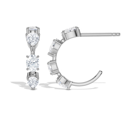 Artistic whitegold crawler earrings with moissanite stones