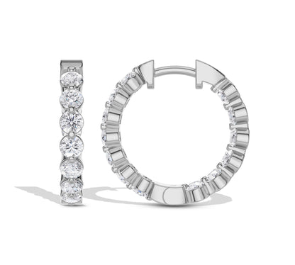Radiant round diamonds on gold hoop earrings