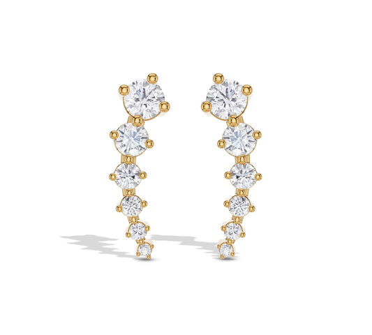 Long graduated diamond earrings in yellow gold