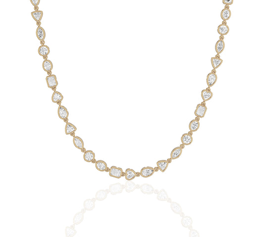 Close-up of gold bezel-set diamond tennis necklace