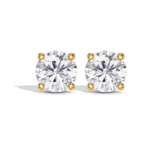 Round cut diamond studs yellow gold