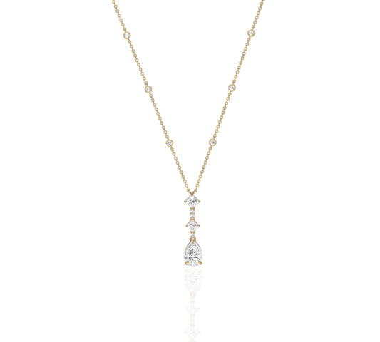 Minimalist pear diamond drop necklace with station chain