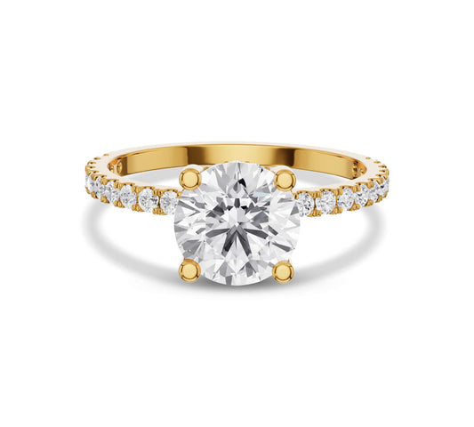 Round brilliant cut solitaire ring in yellow gold