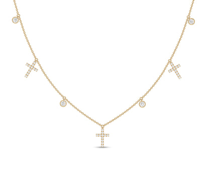 Yellow gold necklace with cross and bezel-set diamonds